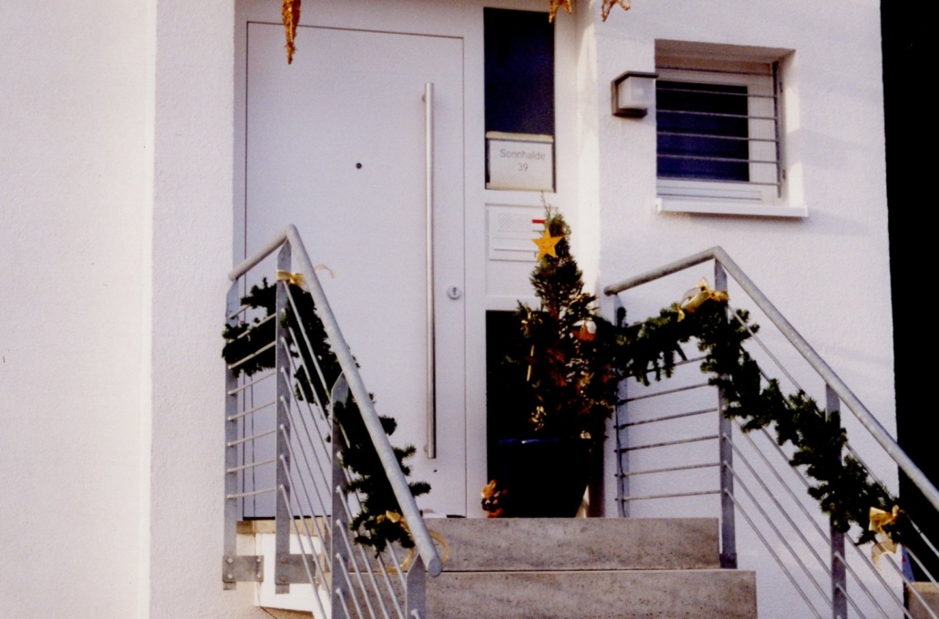 Old image of a white entrance door