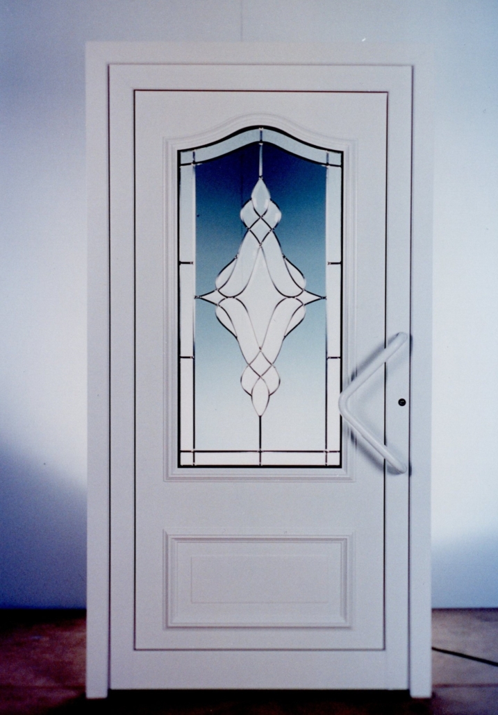 One of the first Inotherm entrance doors – white door with stained glass